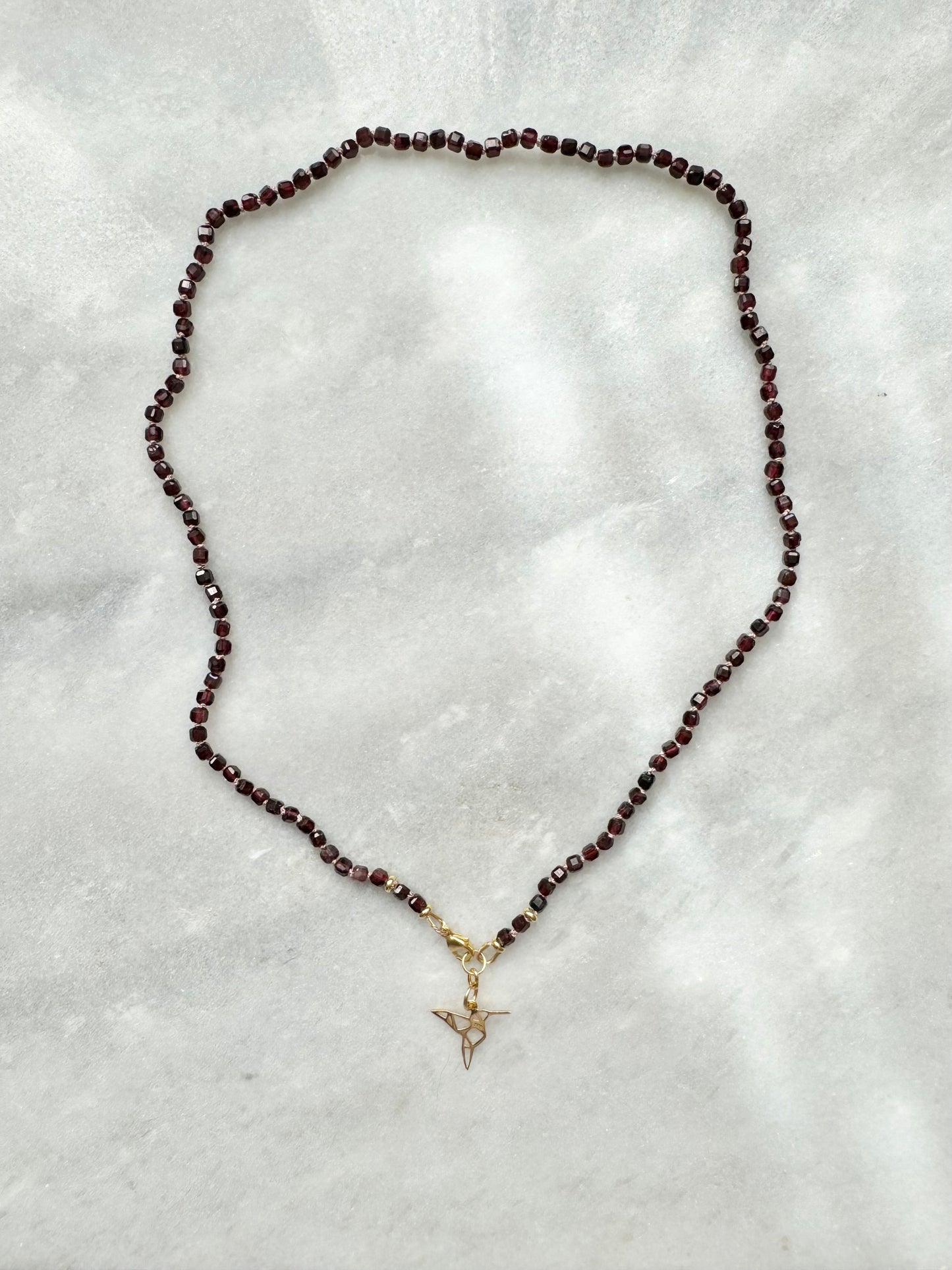 Hand Knotted Garnet Necklace / Hummingbird Charm
