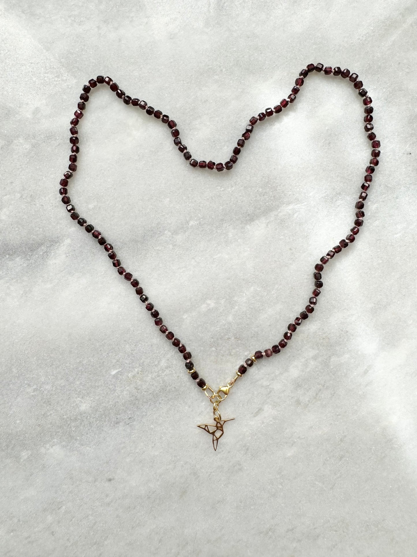 Hand Knotted Garnet Necklace / Hummingbird Charm