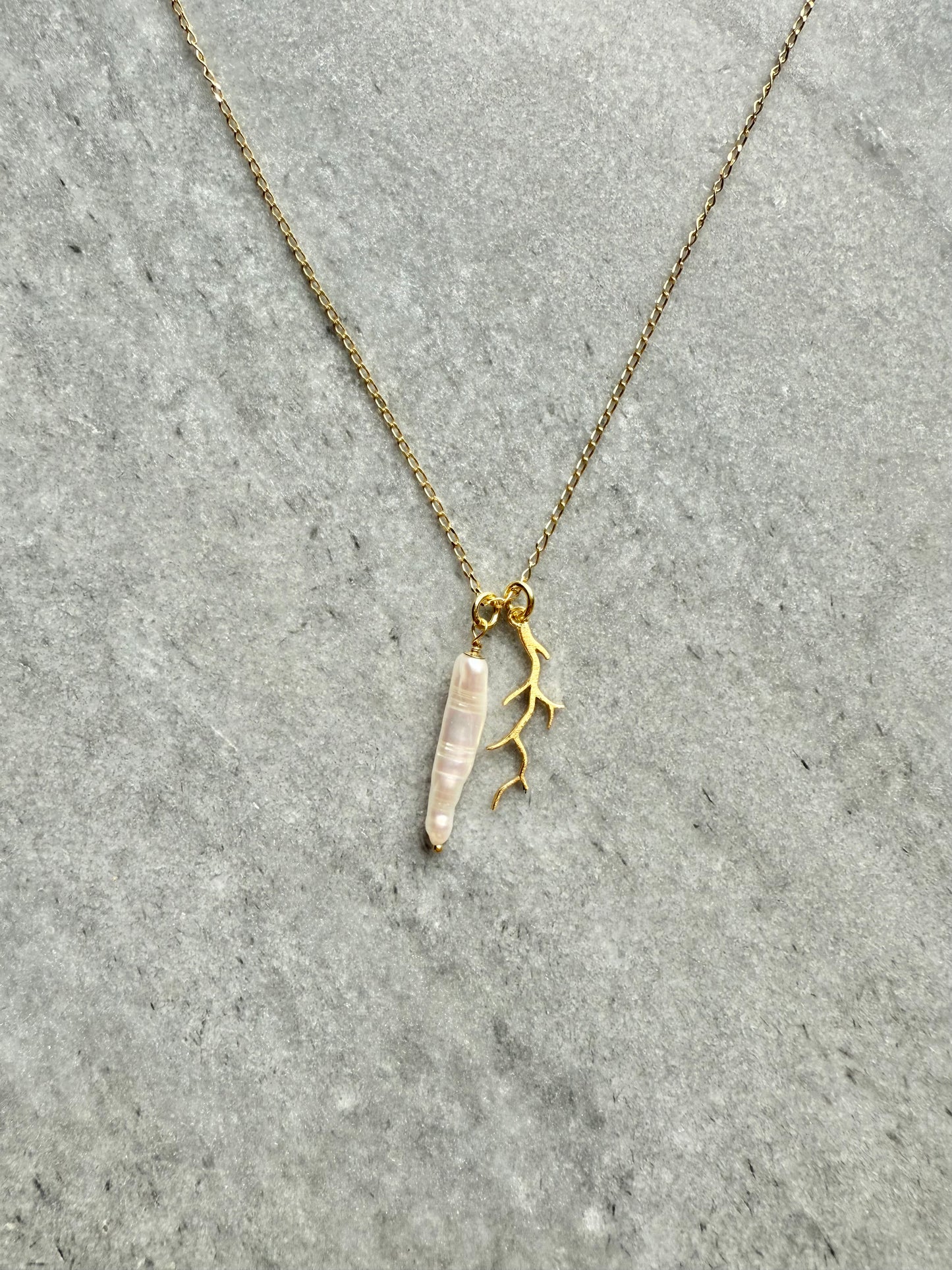 Elegant artisan gold necklace inspired by the sea