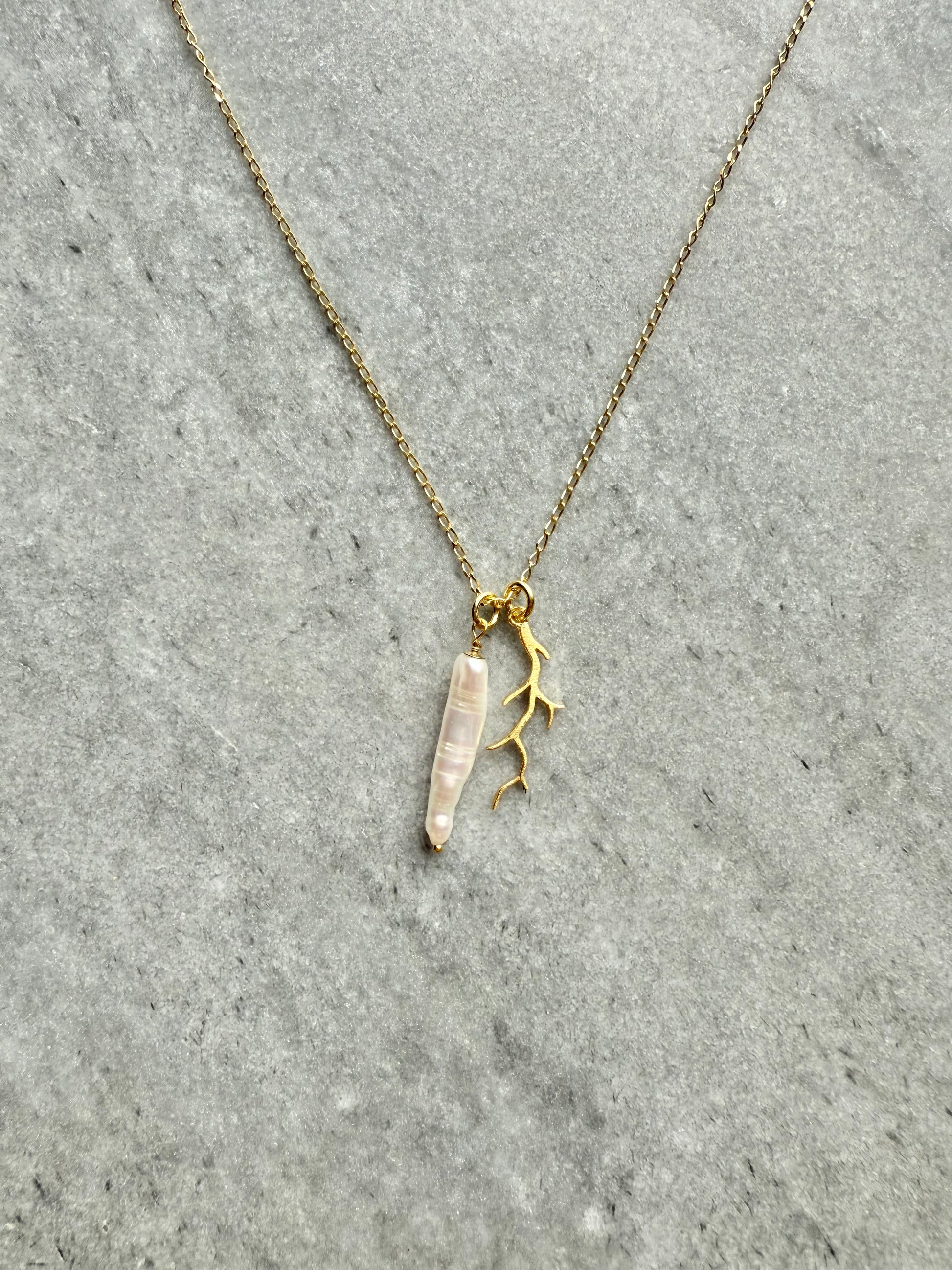 Elegant artisan gold necklace inspired by the sea