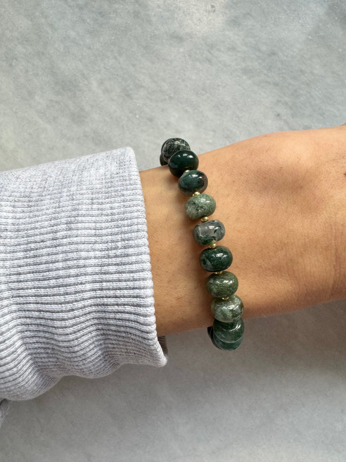 Moss Agate bracelet presented on the wrist