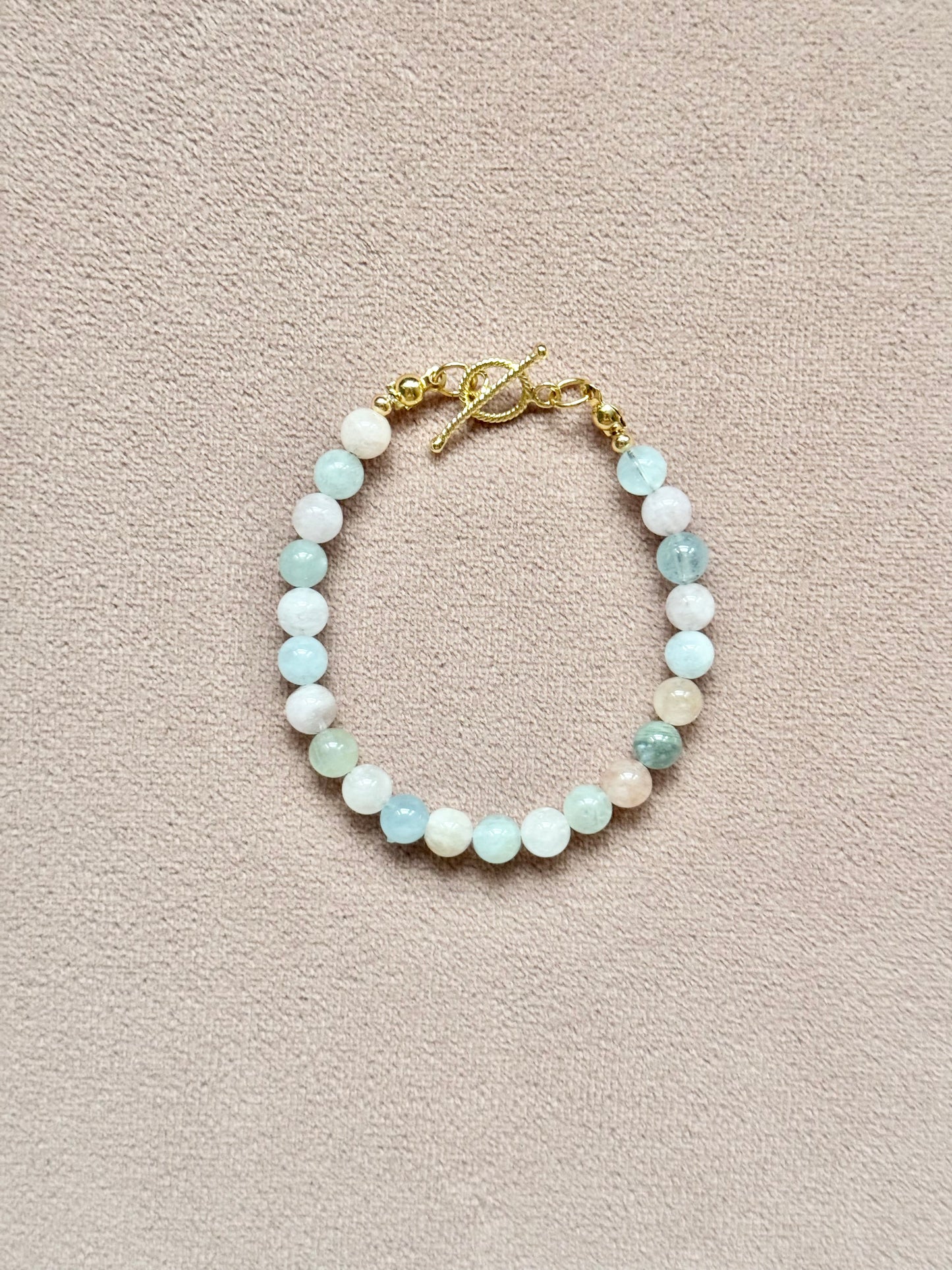 Armband aus rosa Opal- und Muschelperlen